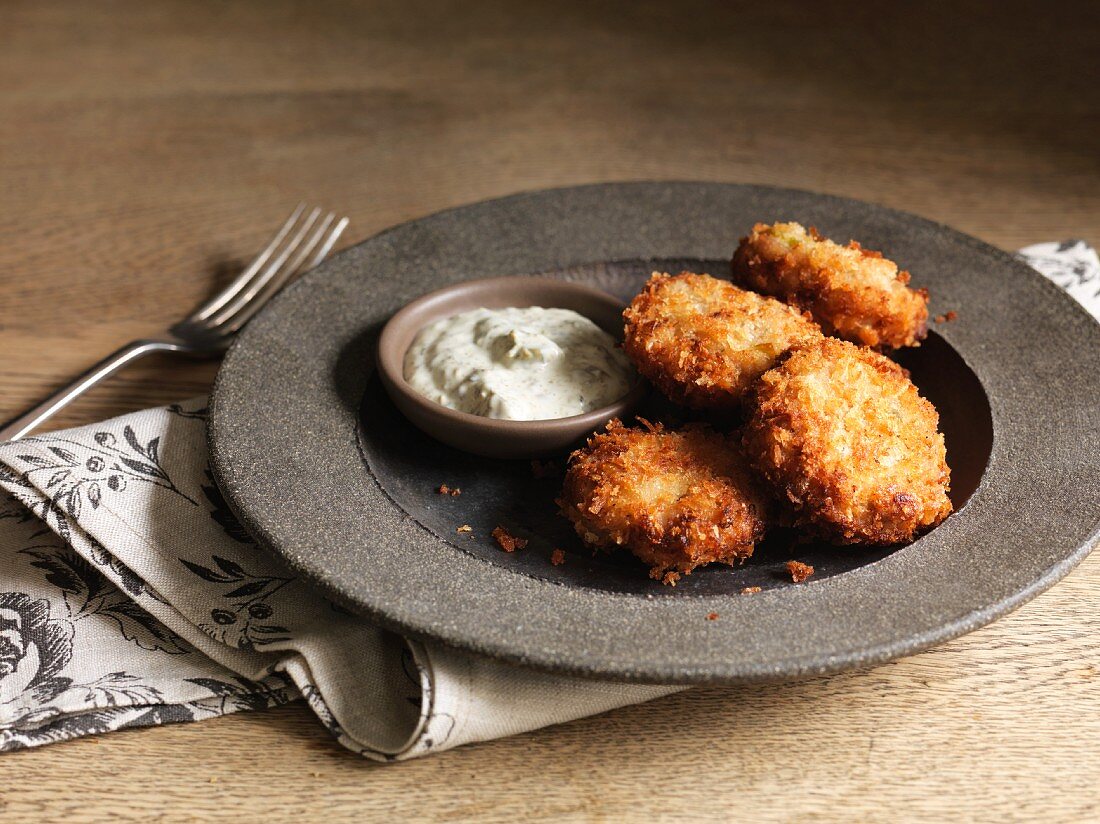 Crispy fish cakes with a dip