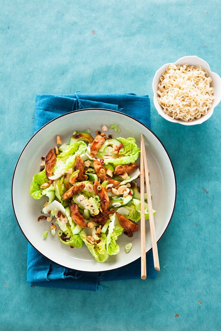 Oriental chicken salad with cucumber and cashew nuts