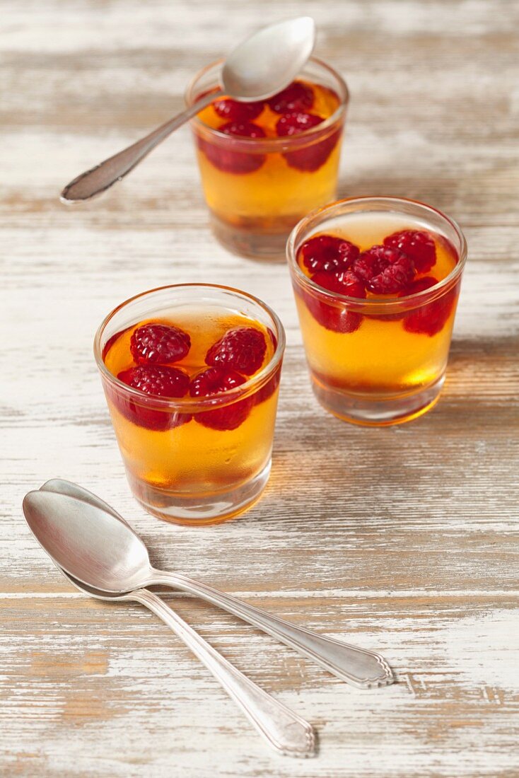 Orange jelly with raspberries