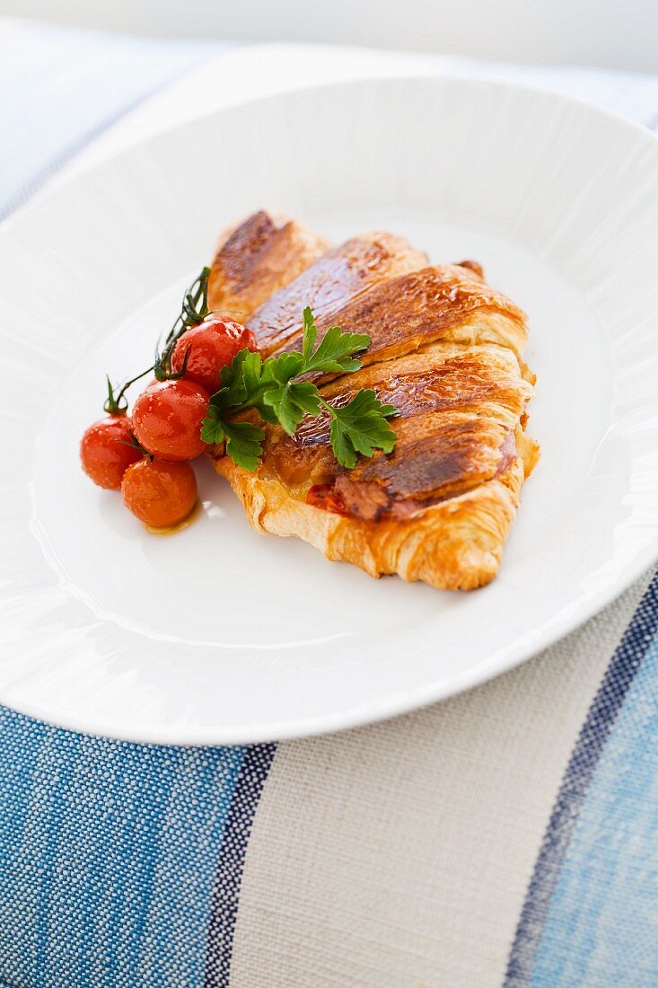 Cheese croissant with cocktail tomatoes (Trevose Harber House Hotel in St. Ives, Cornwall, England)