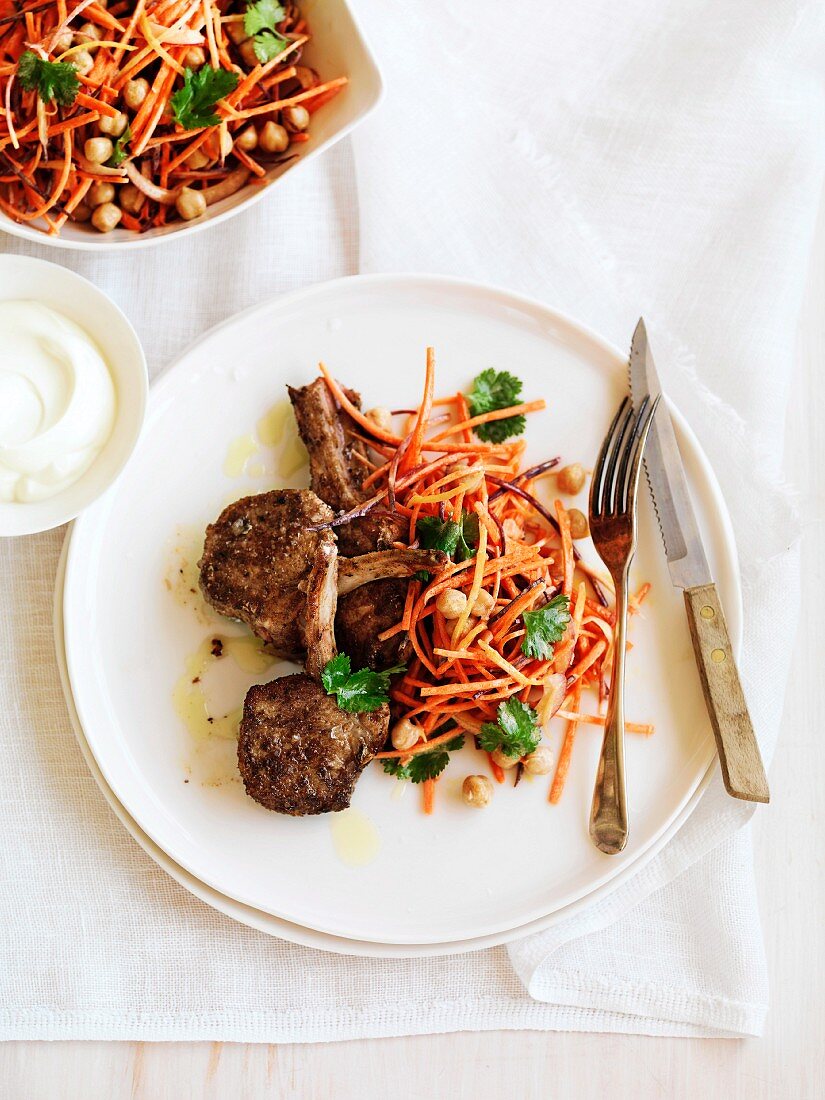 Spicy lamb chops with carrot and chickpea salad