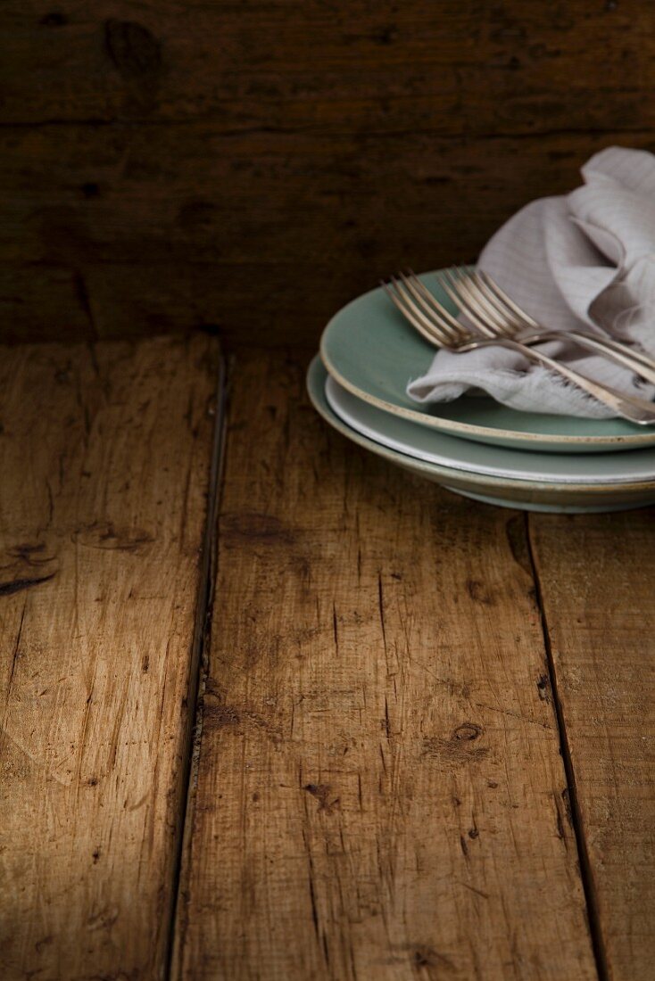 Rustic plates on a wooden surface