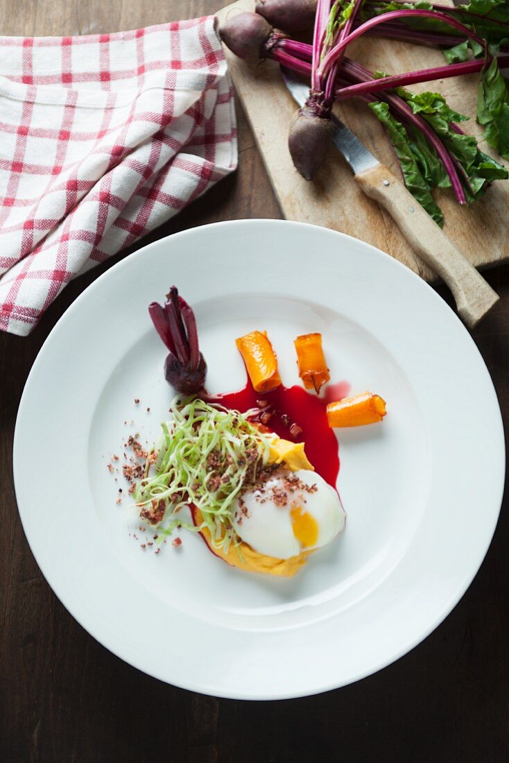 A poached egg with beetroot sauce