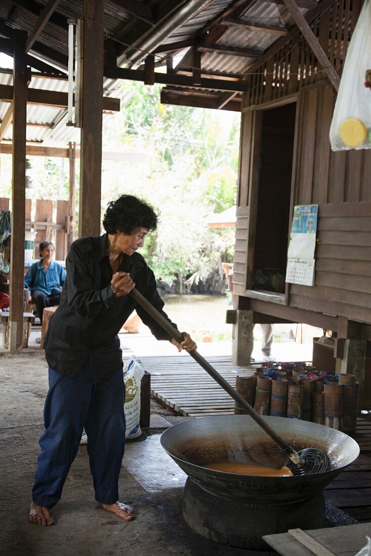 Coconut sugar being made, Thailand