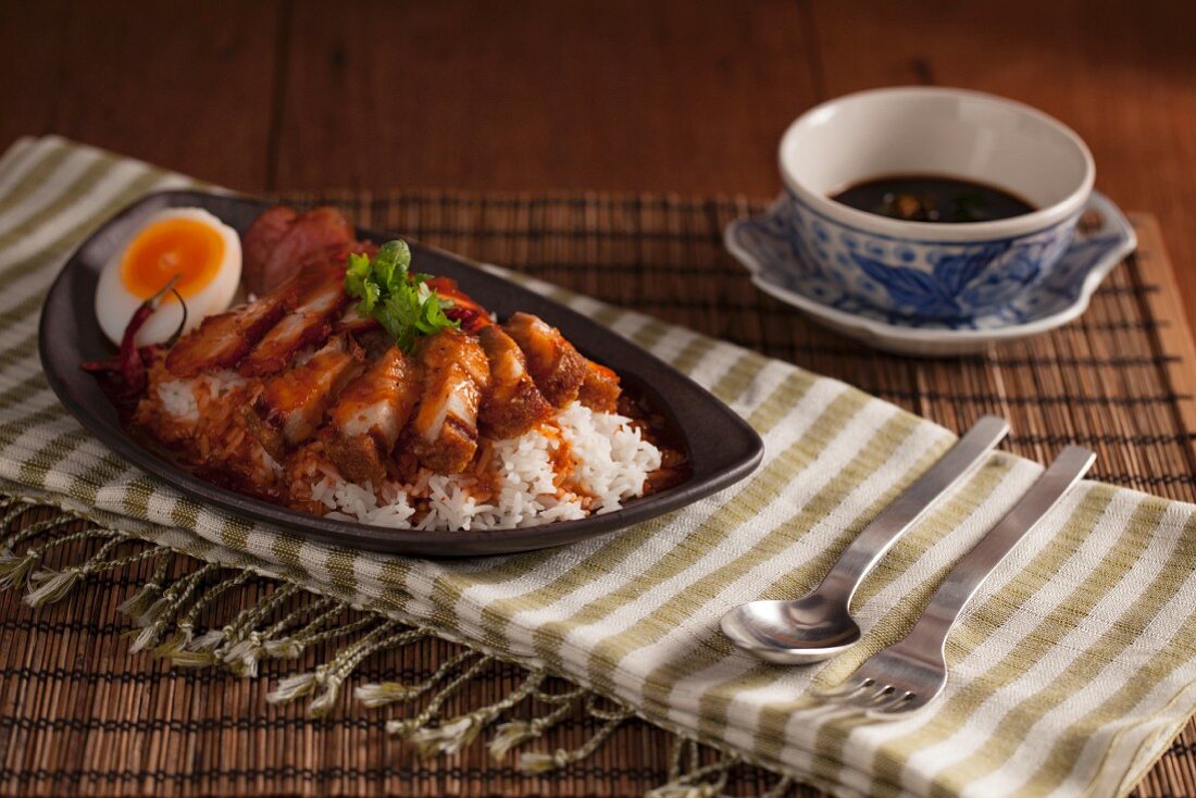 Khao Mu Dang Mu Grob - crispy pork with sauce on a bed of rice (Thailand)
