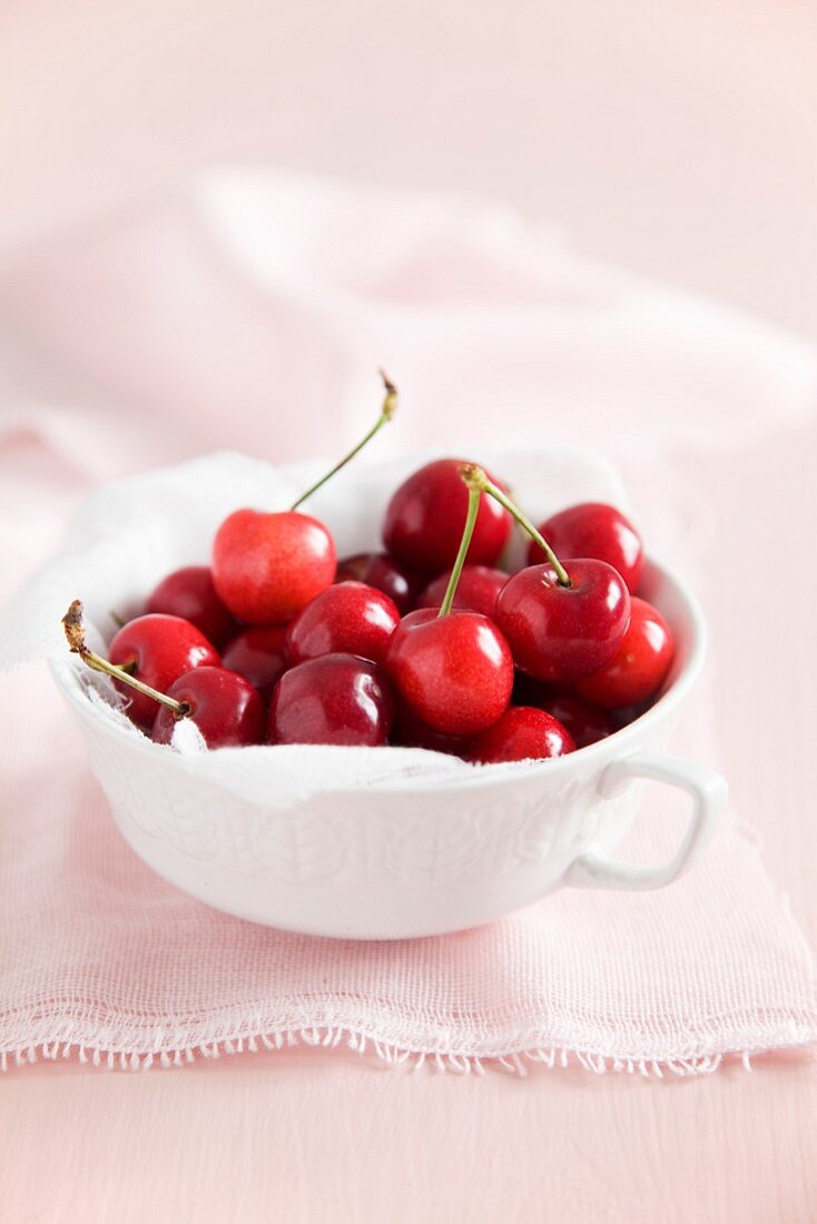 A cup of fresh cherries