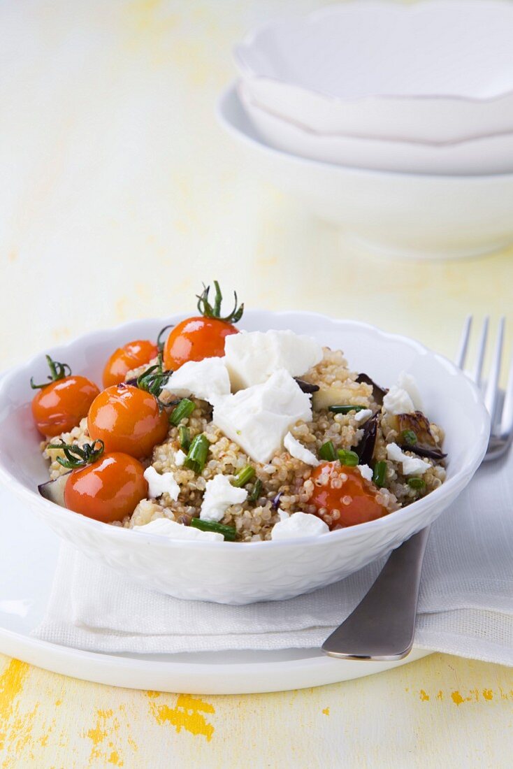 Quinoa salad with aubergines, cherry tomatoes and feta cheese