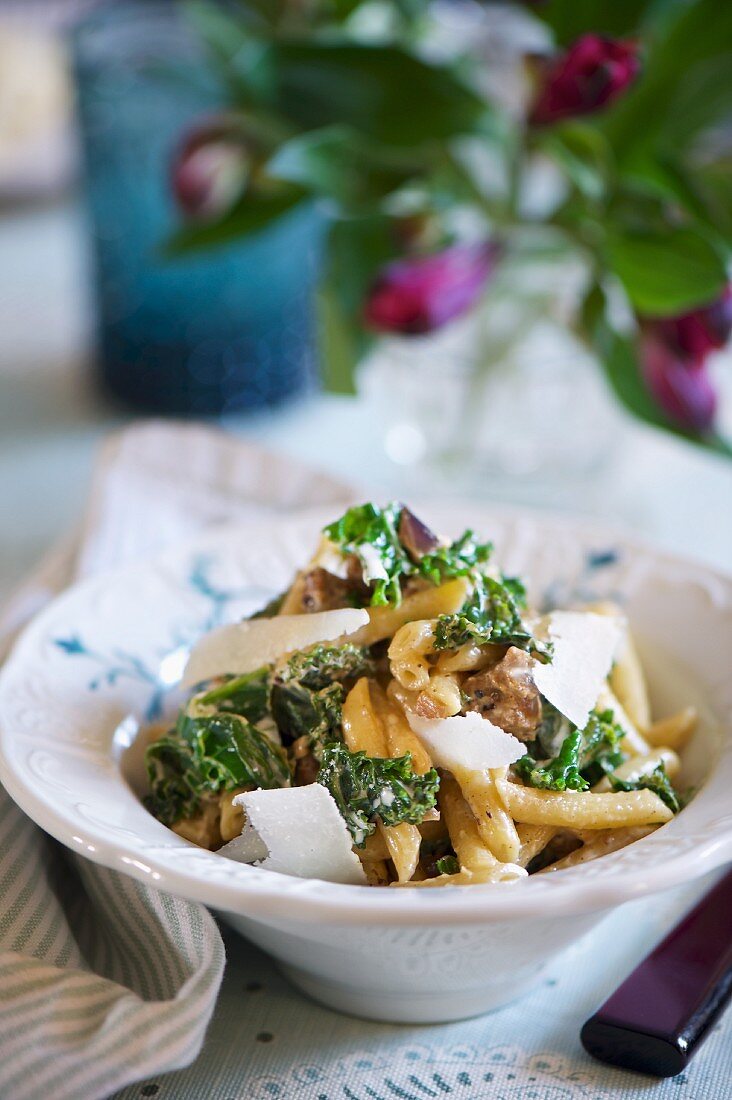 Penne pastel with salsicce, kale and Parmesan cheese