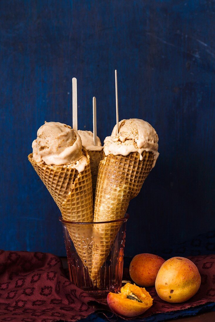 Apricots ice cream in cones