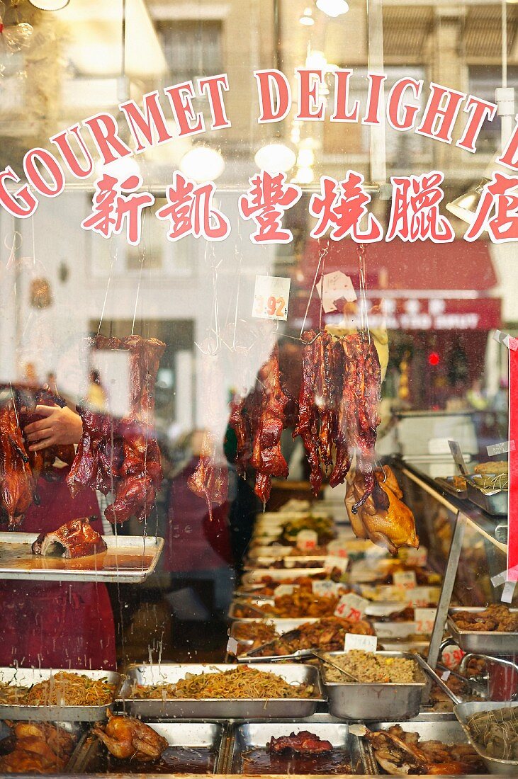 A view through a window into an oriental butcher's in Stockton (China Town, San Francisco)