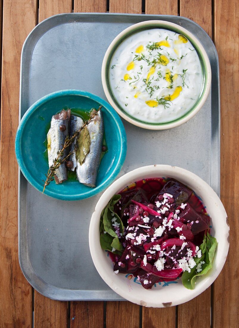 Greek mezze: fish, yoghurt and beetroot salad