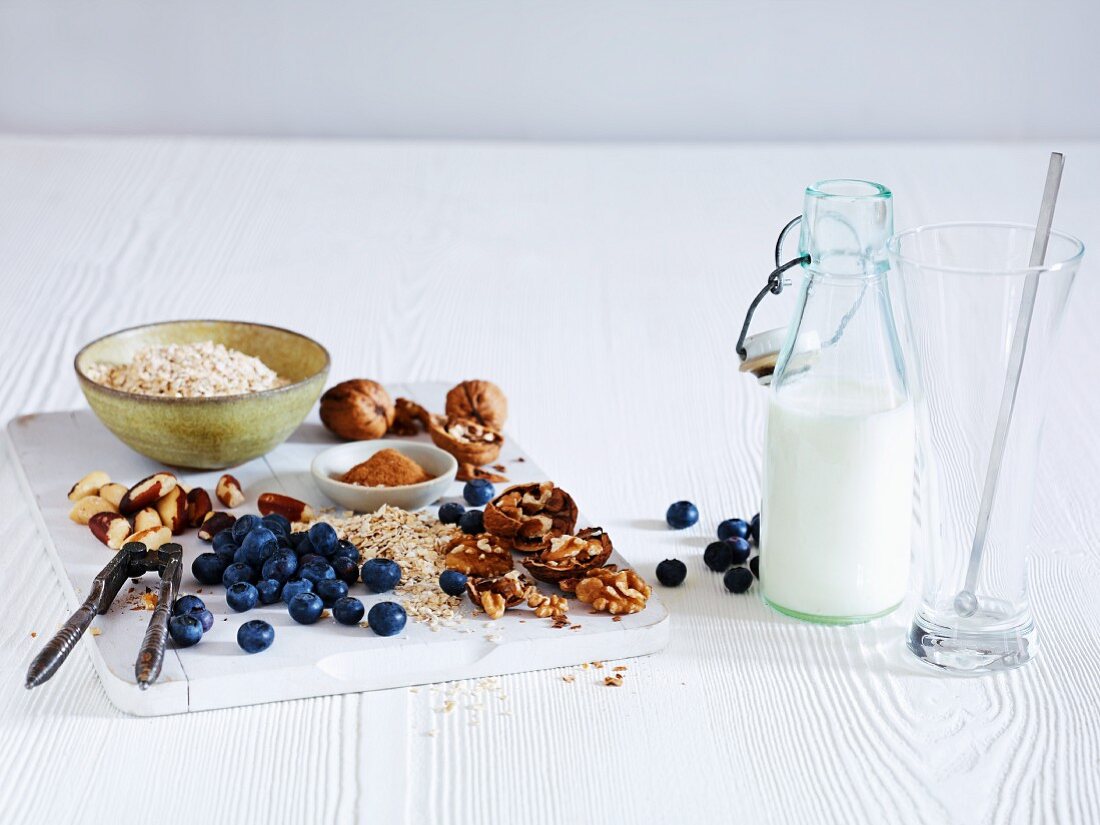 Blueberries, nuts, oats and milk