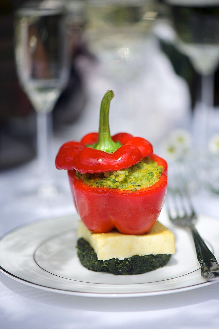 A pepper filled with polenta and spinach