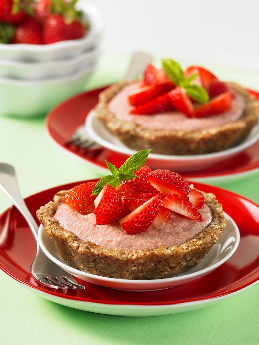 Coconut and strawberry tartlets