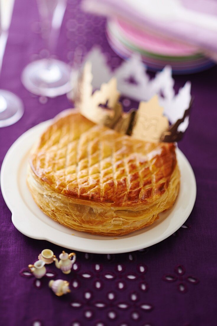 Puff pastry chocolate cake decorated with a crown (France)