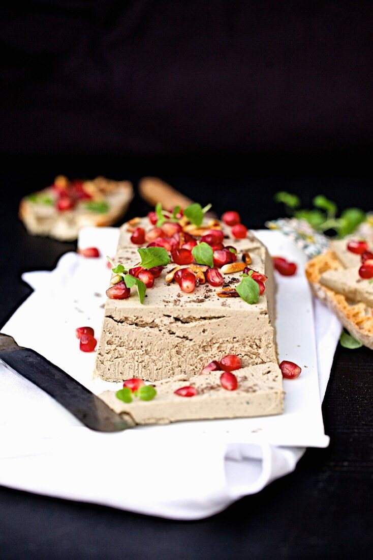 Goose liver terrine with pomegranate seeds