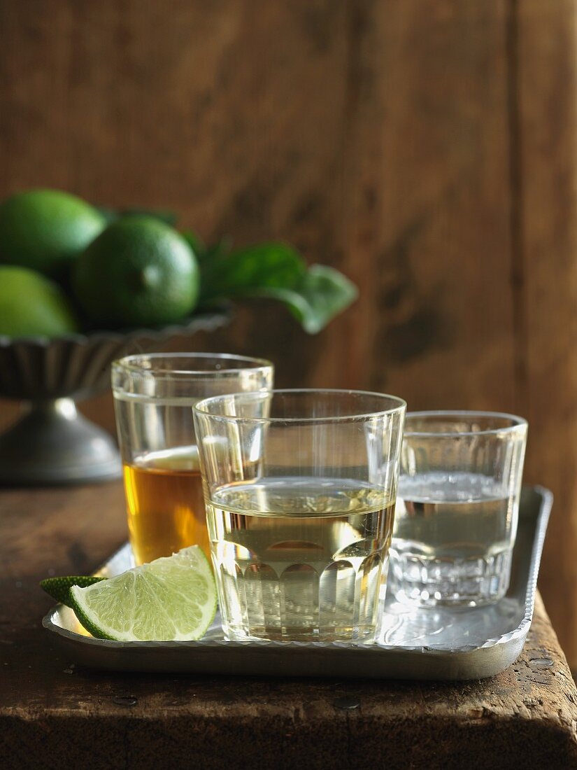 Three kinds of tequila with fresh limes