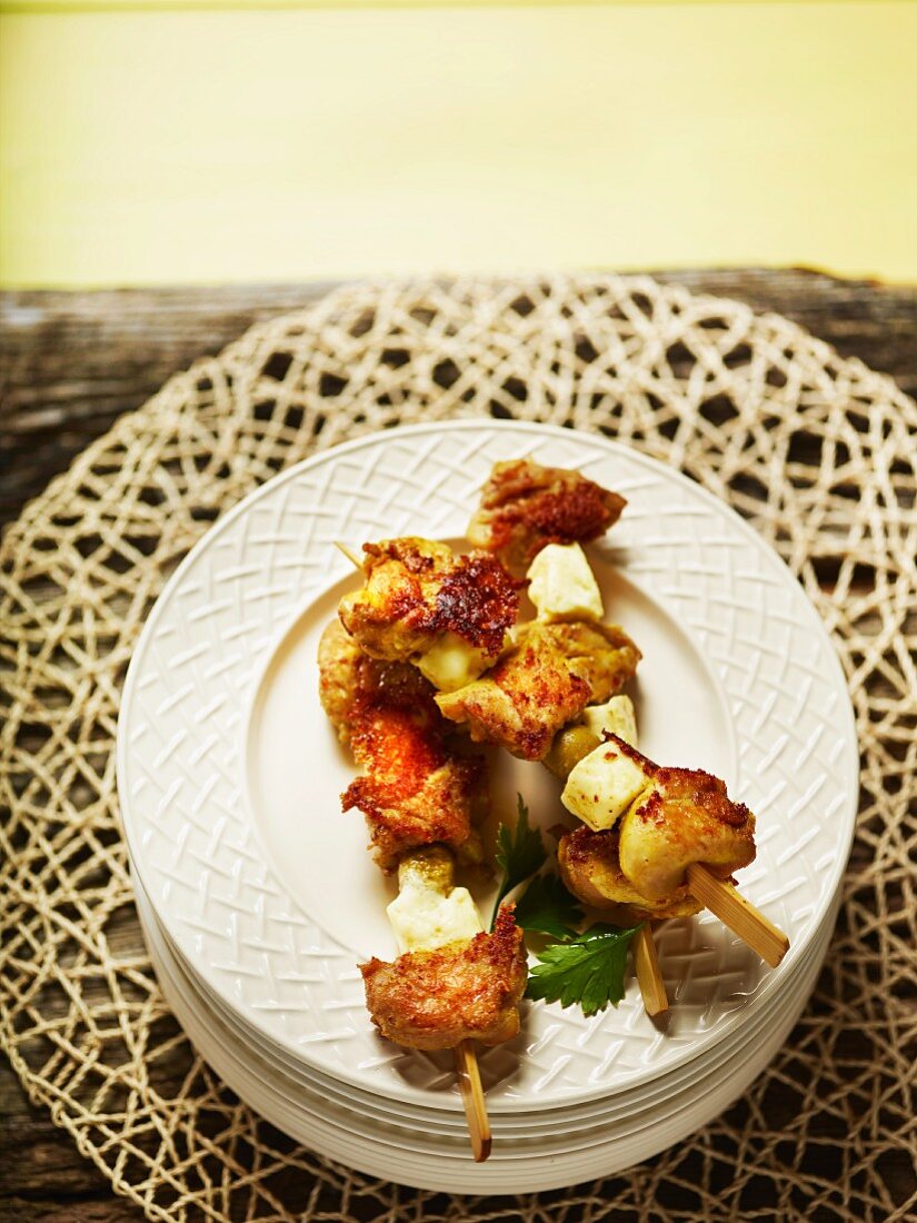 Marinated chicken skewers with olives and Paneer cheese