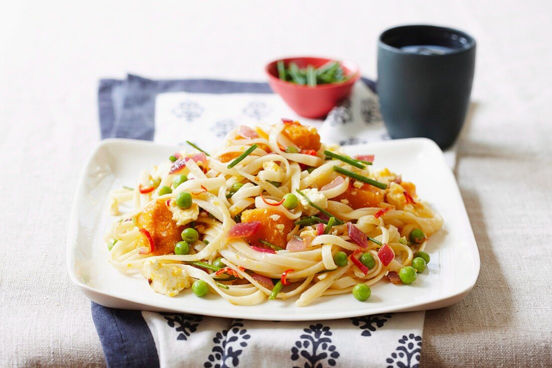 Linguini with pumpkin and peas