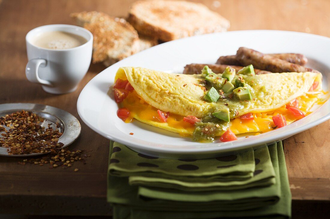 Tex-Mex omelette with avocados and sausages