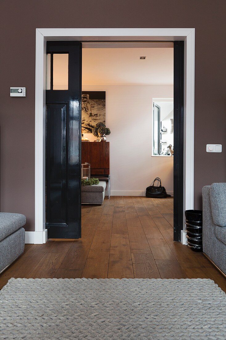 View of sideboard through open sliding door