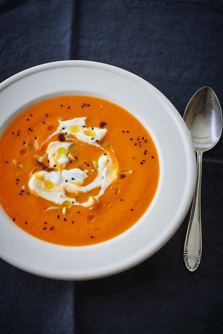 Pumpkin soup with crème fraîche and sesame seeds