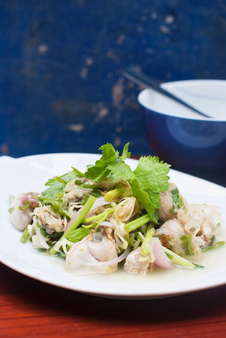 Spicy fresh oyster salad (Thailand)