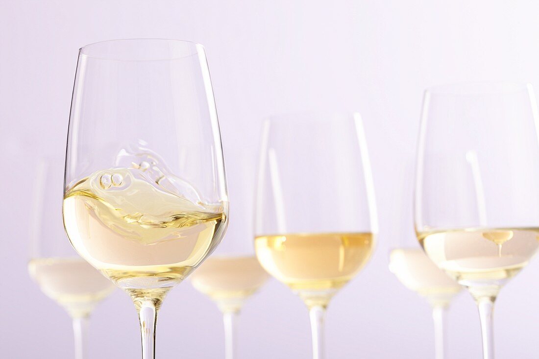 Several glasses of white wine
