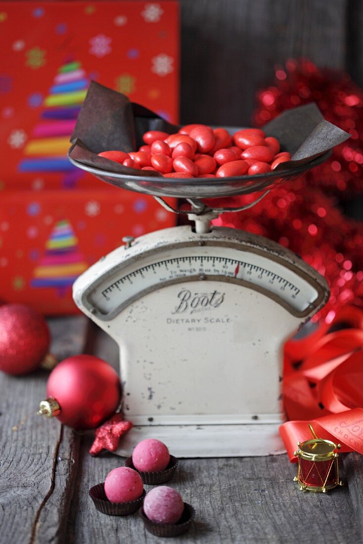 Christmas sweets on a pair of old scales