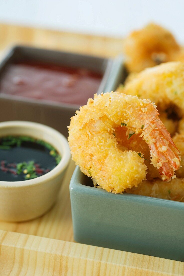 Coconut battered prawns with a dip