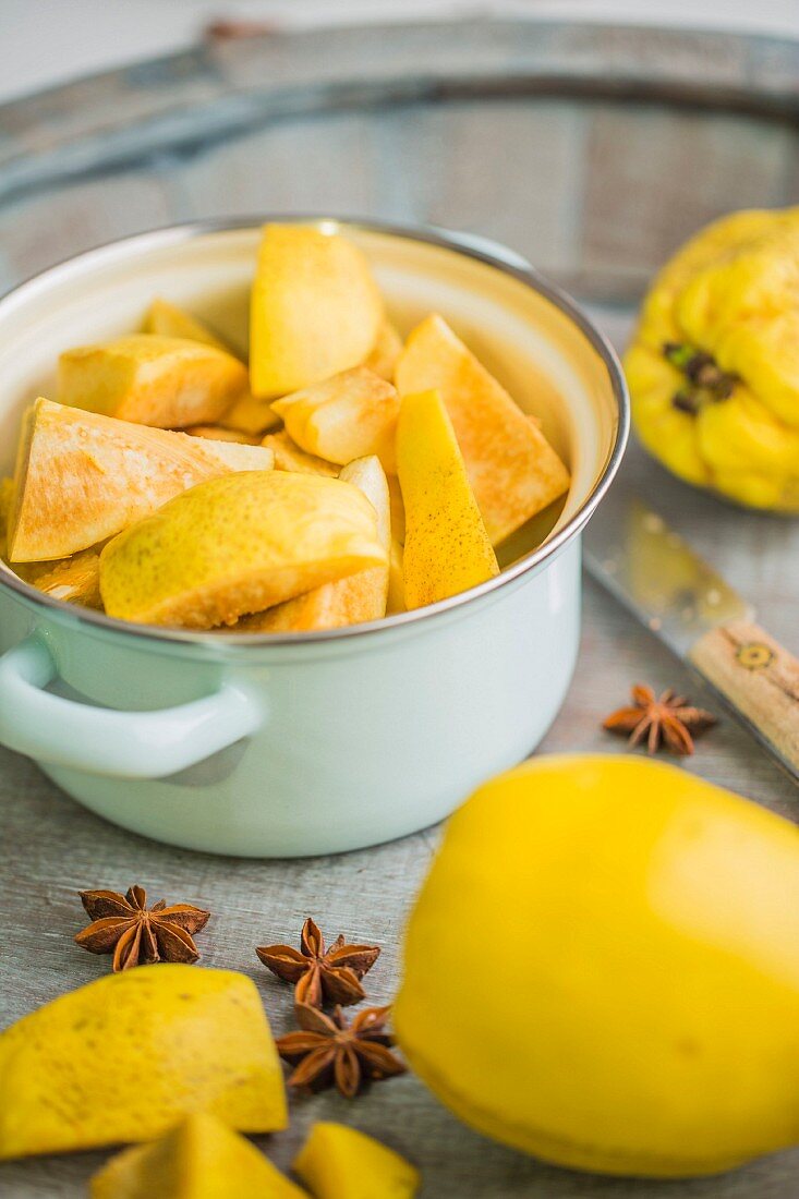 Quinces in a pot, chopped