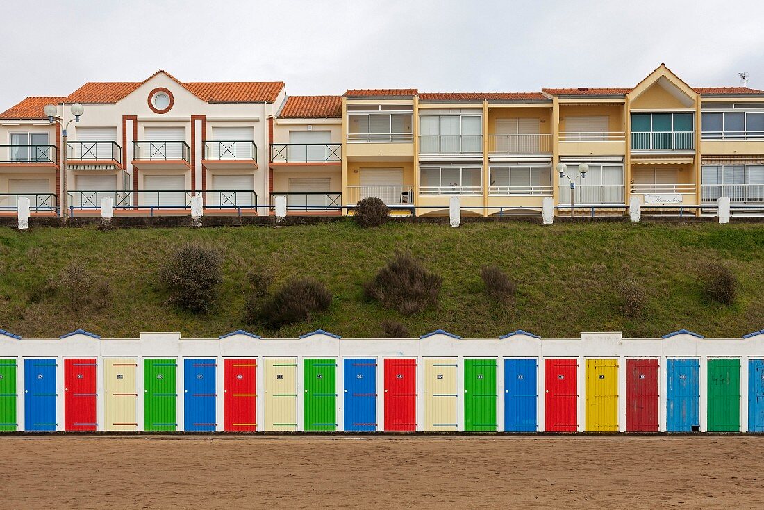 Row of colourful beach huts in Tharon-Plage (Loire-Atlantique, France)