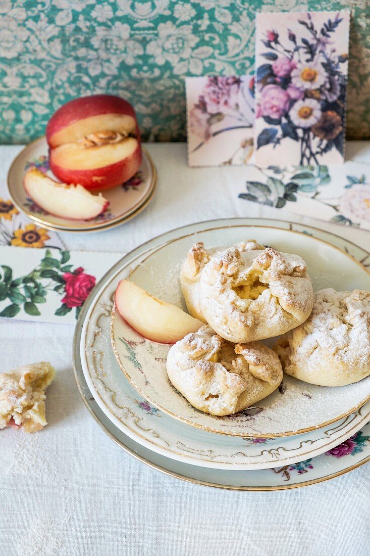 Ricotta and peach biscuits with icing sugar