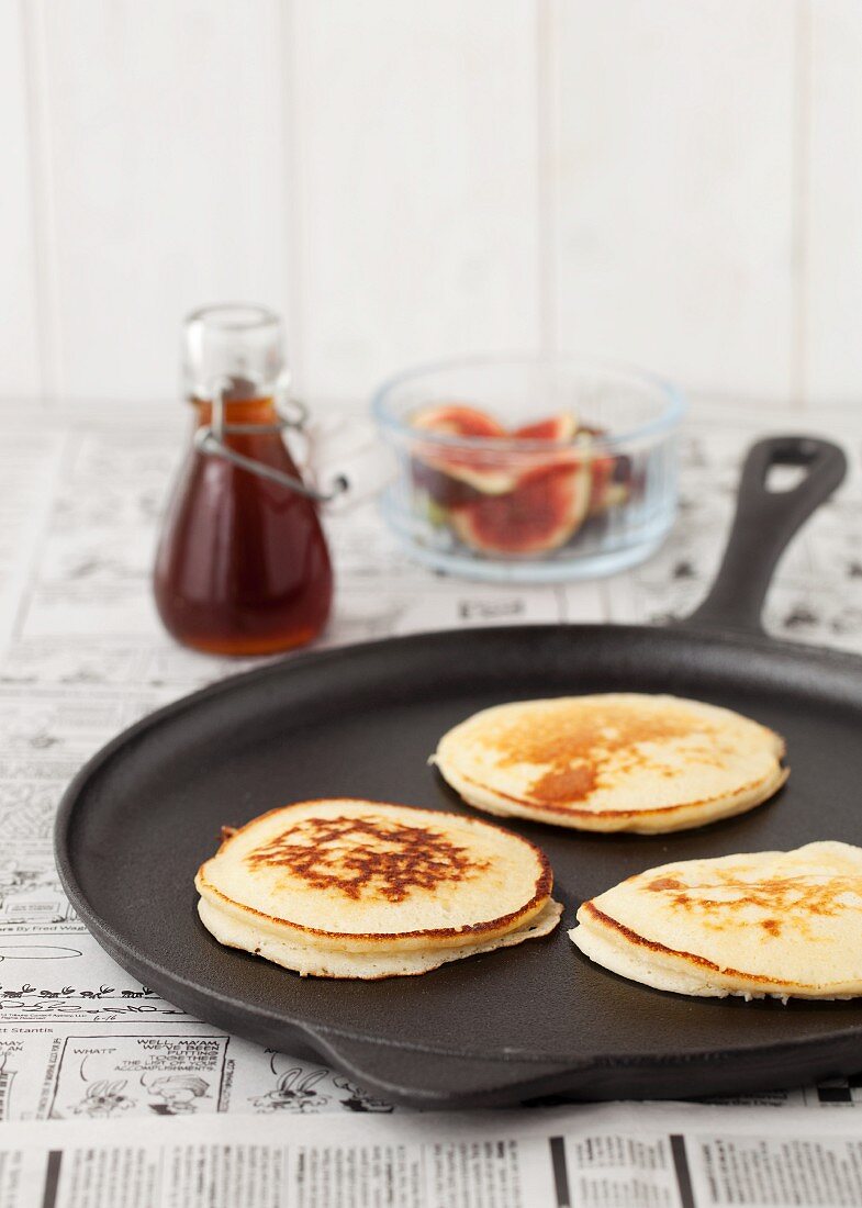 Three American pancakes in a pan ready to be served