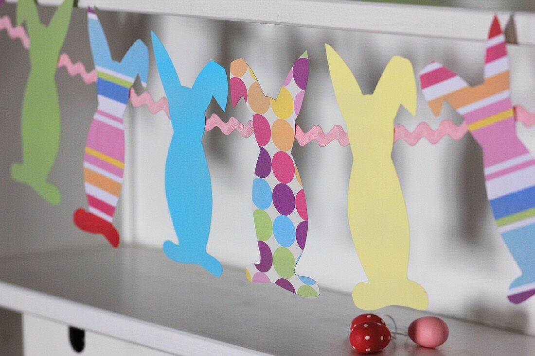 Easter garland of colourful, construction paper bunnies