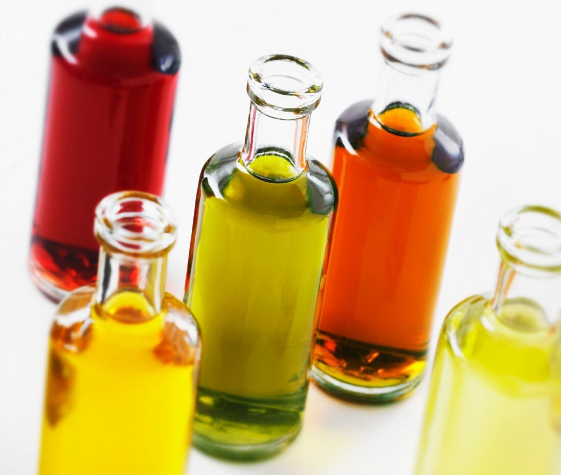Various bottles of vinegar and oil
