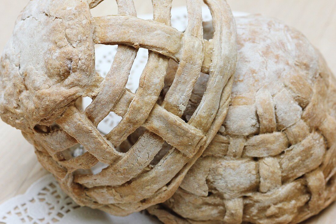 Woven baskets of bread dough for Easter table