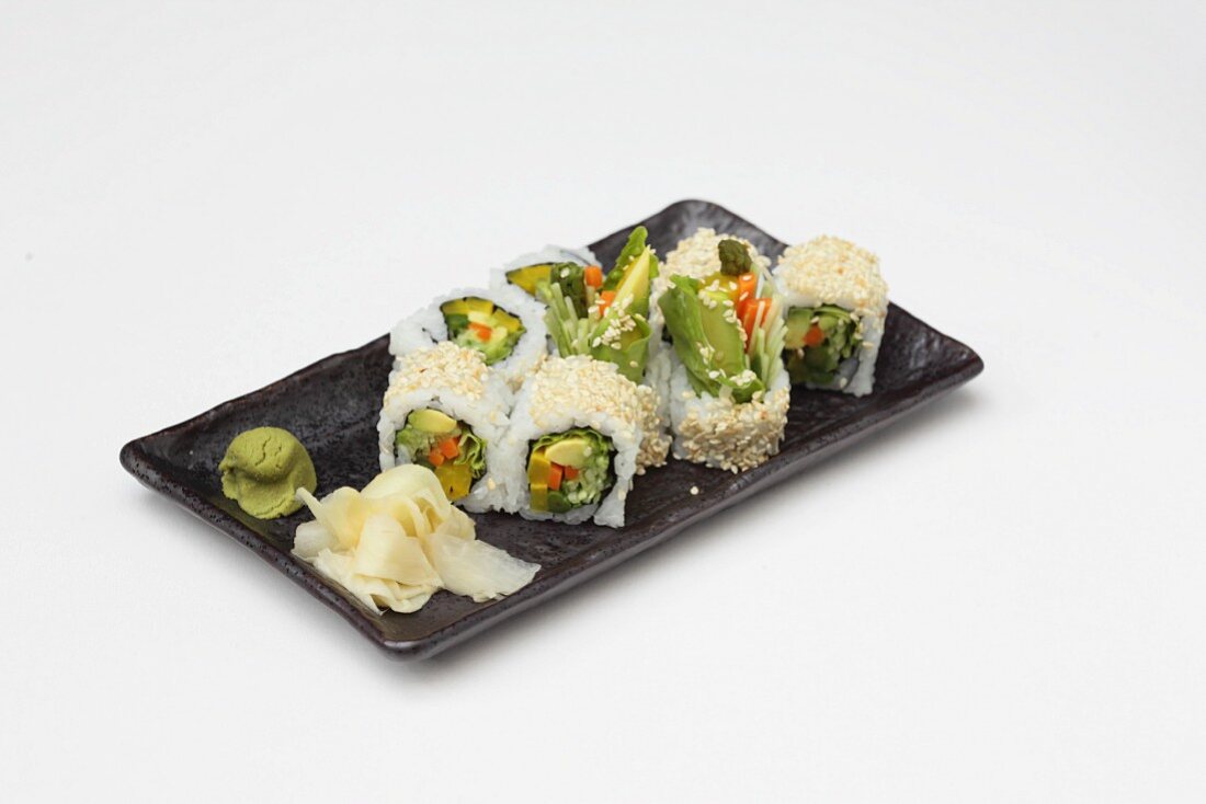 Maki with avocado and vegetables served with ginger and wasabi (Japan)