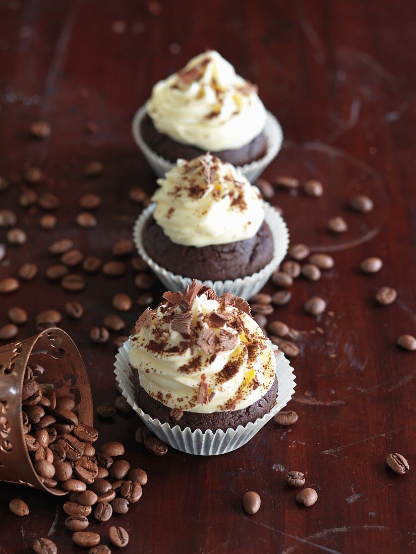 Chocolate and coffee cupcakes decorated with mocha beans