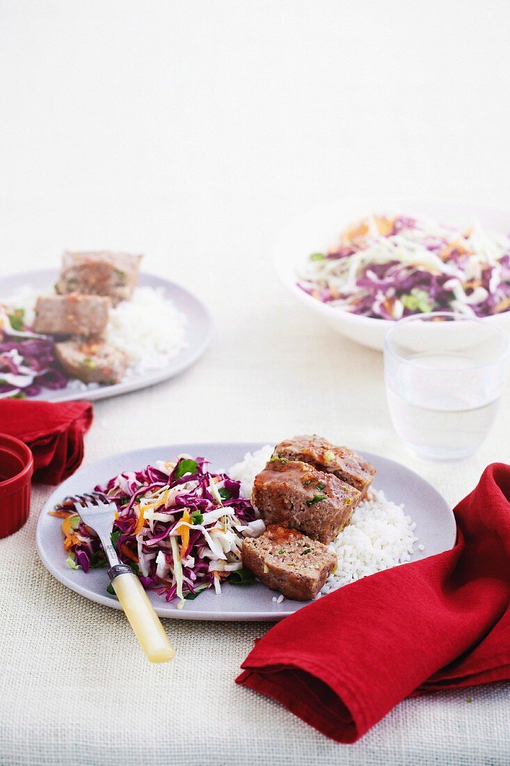 Sweet chilli mini meatloaf with coloured cabbage salad on rice