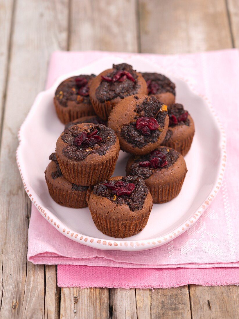 Chocolate muffins with poppyseeds and cranberries