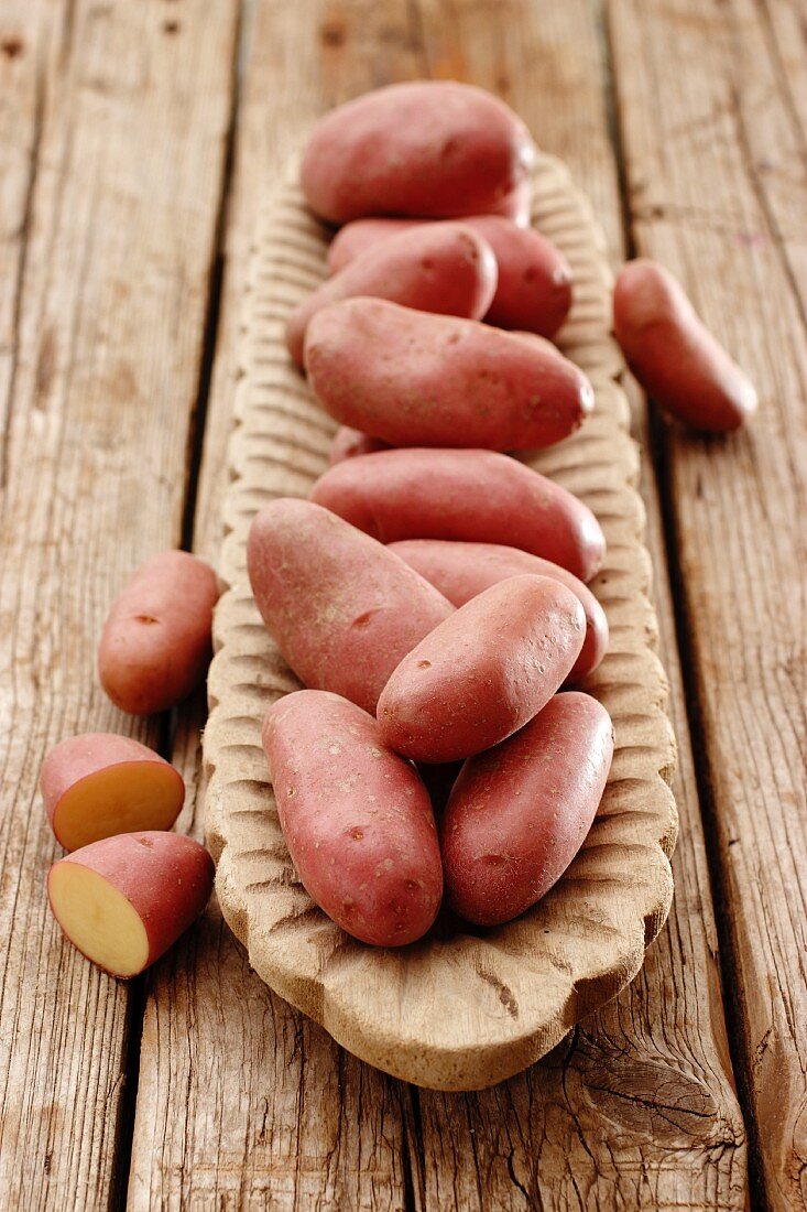 Red-skinned 'Cherie' potatoes in a wooden dish