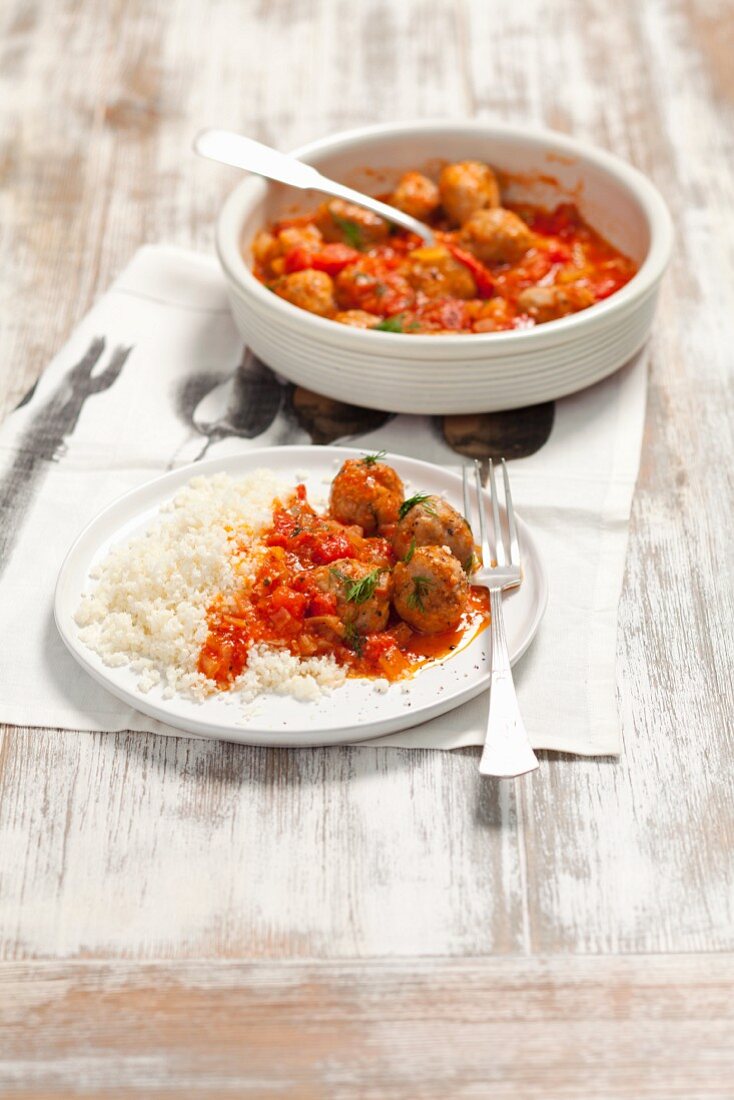 Beef meatballs in tomato sauce with cauliflower couscous