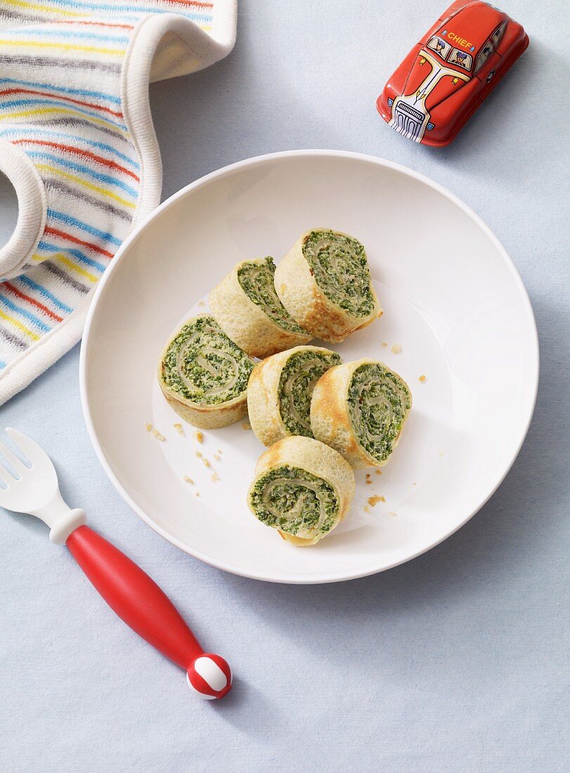 Pancake rolls with spinach as baby food