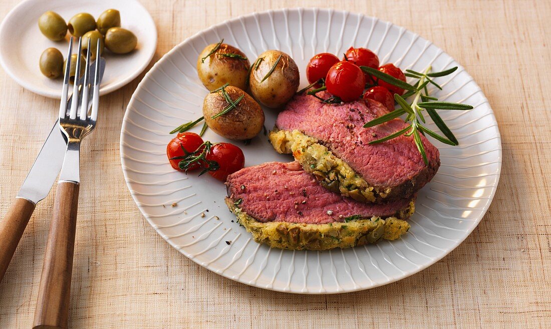 Roast beef with an olive and herb crust