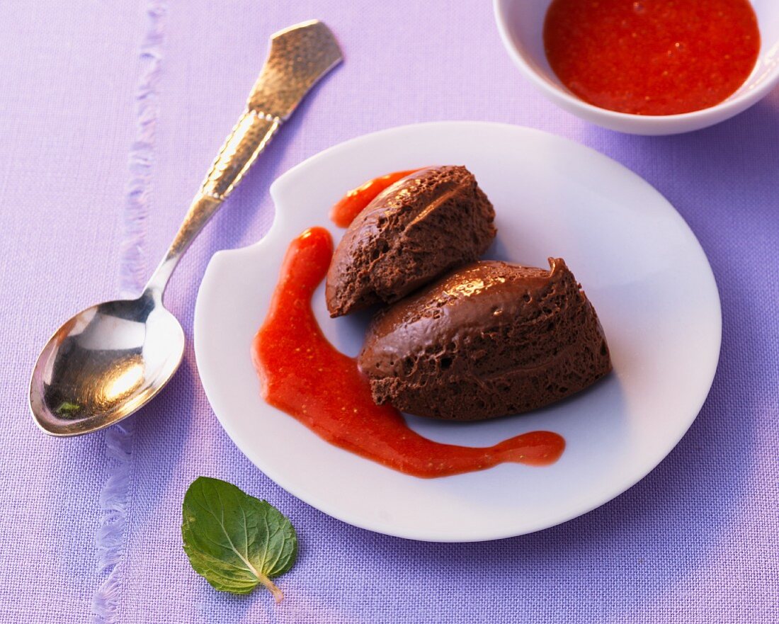 Chocolate mousse with strawberry puree