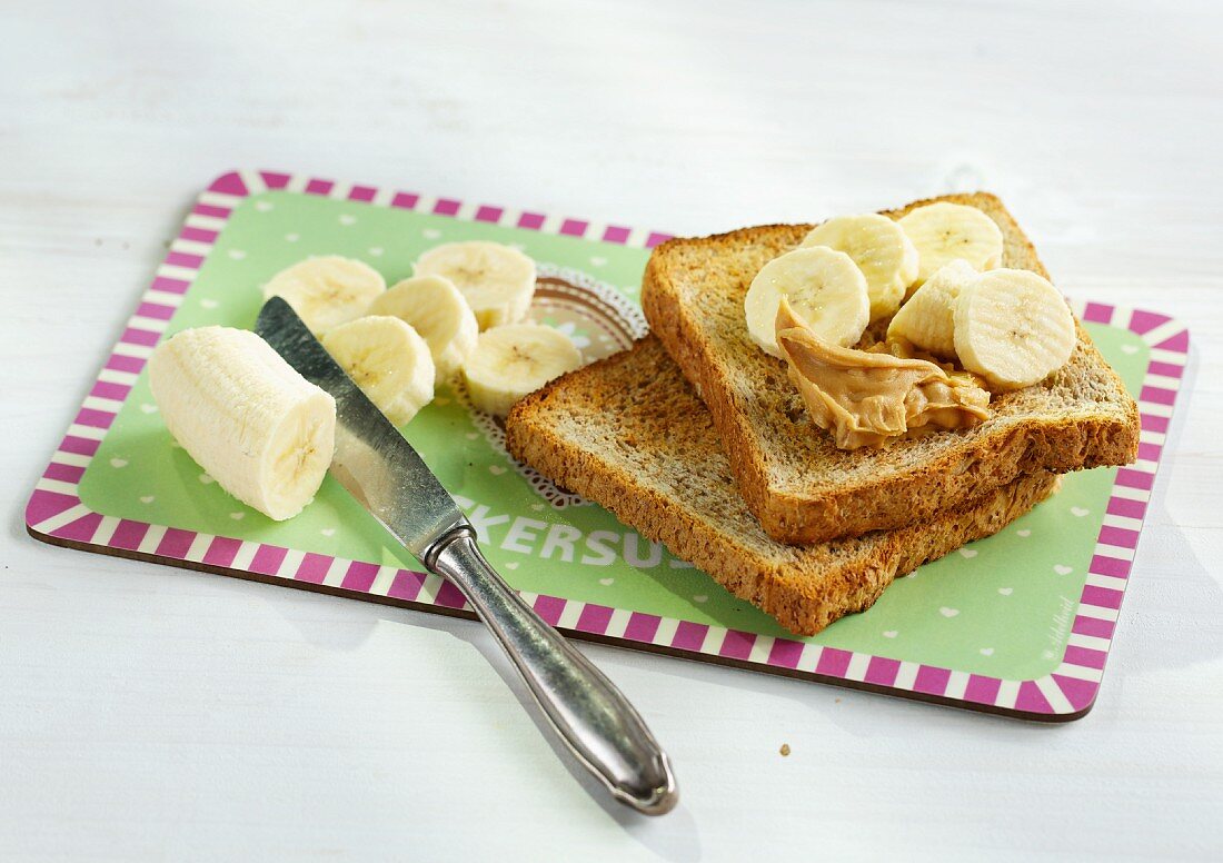 Wholemeal toast with peanut butter and fresh bananas