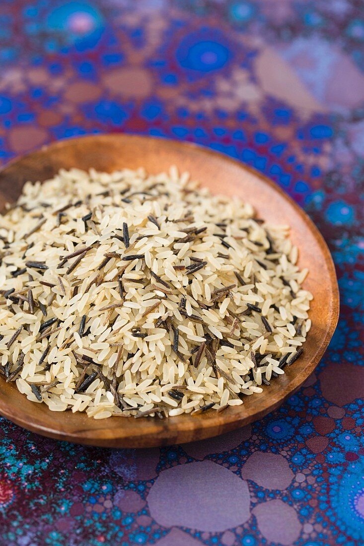 Natural rice on a wooden plate