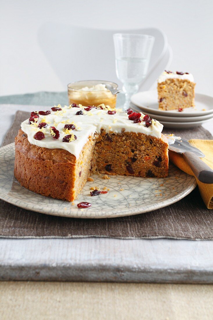 Carrot cake with cream cheese and dried cranberries
