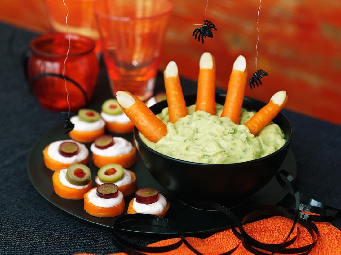 A Halloween dip with carrots and canapes